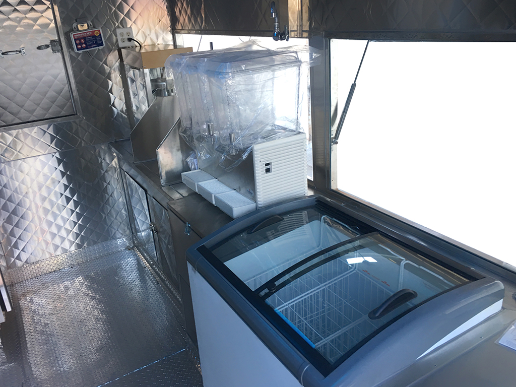 Shaved ice trailer by Kareem Carts Manufacturing Company